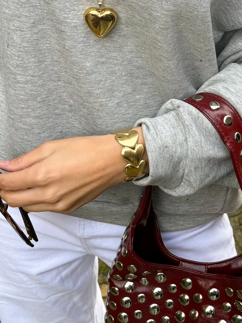 Embrace armband gold