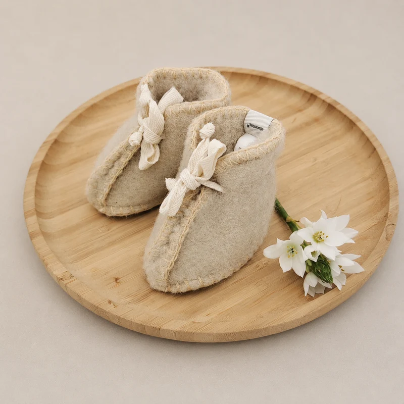 Eerste Wollen Babyslofjes | Thumbled