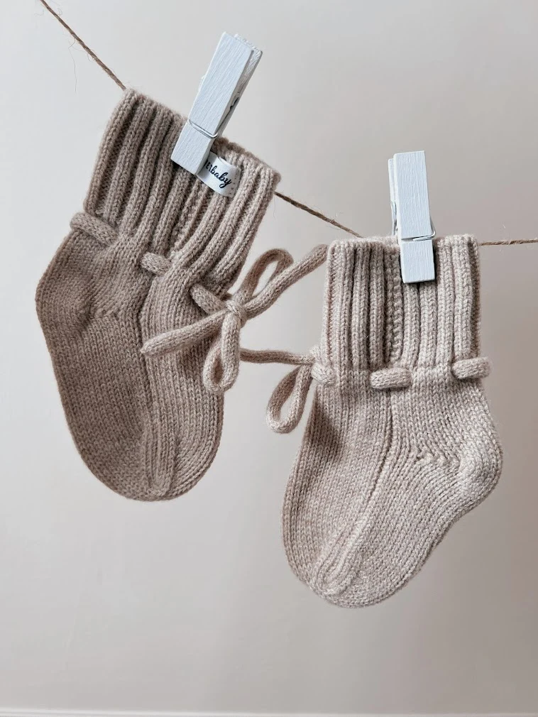 Gebreide babysloffen merino wol - sand